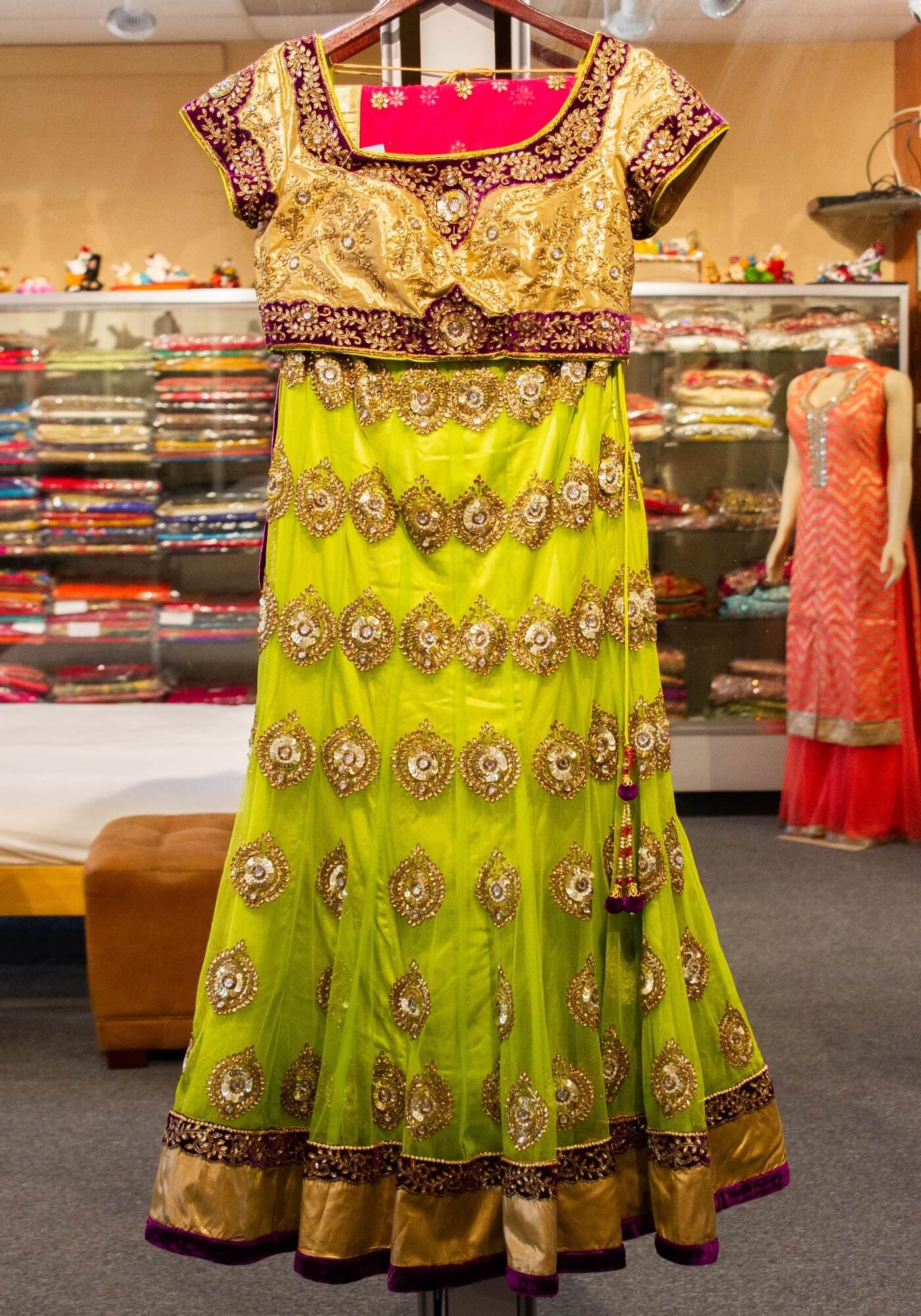 Light Green Lehenga with Dull Gold Choli and Hot Pink Dupatta