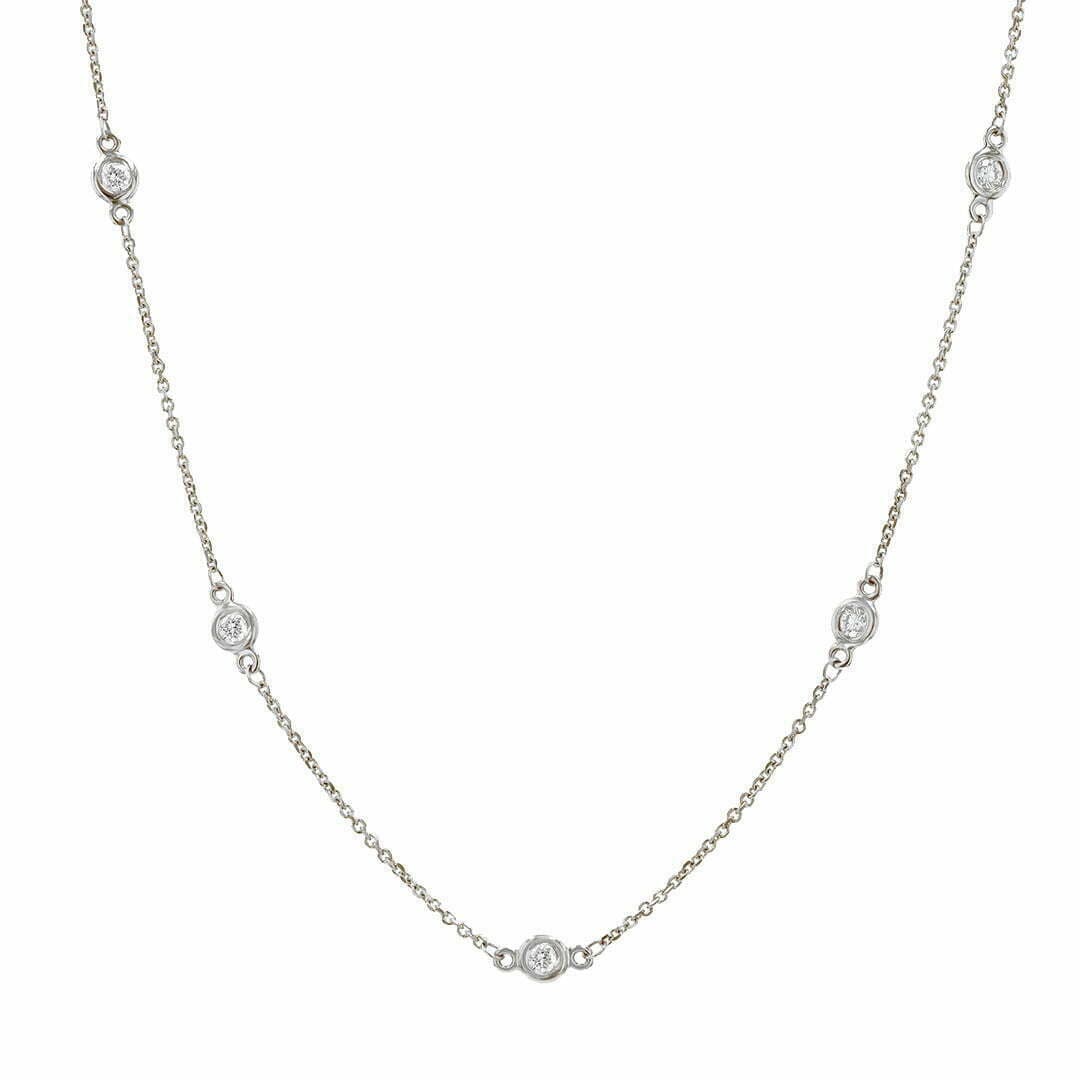 14 Karat Gold, 18″ Diamond By The Yard Necklace Containing 12 Bezel Set Round Cut Diamonds Weighing 0.50 – 1.50 Carats
