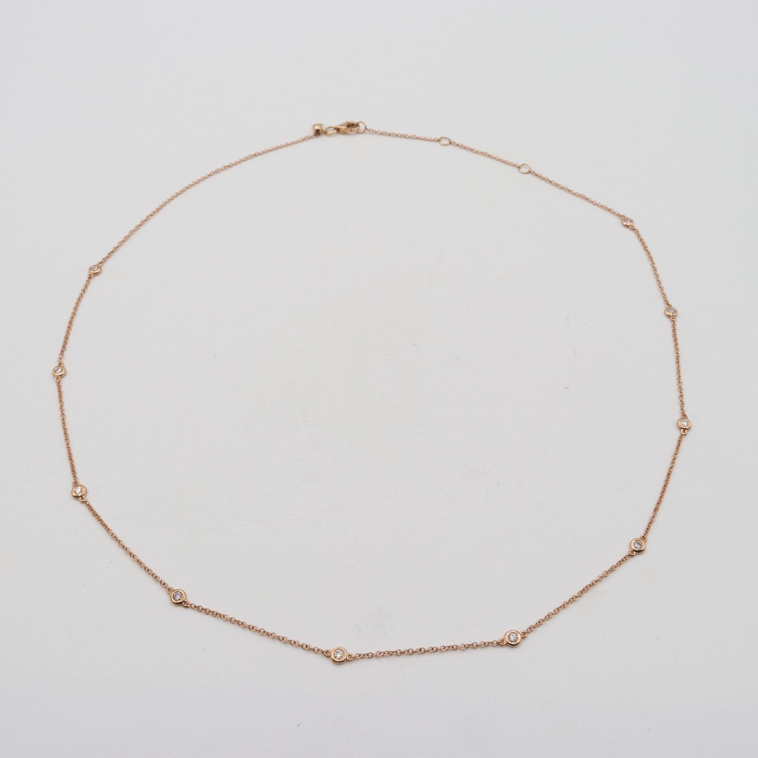 14 Karat Rose Gold & 10 Bezel Set Diamond Necklace Weighing 0.19 Carats. thumbnail 2