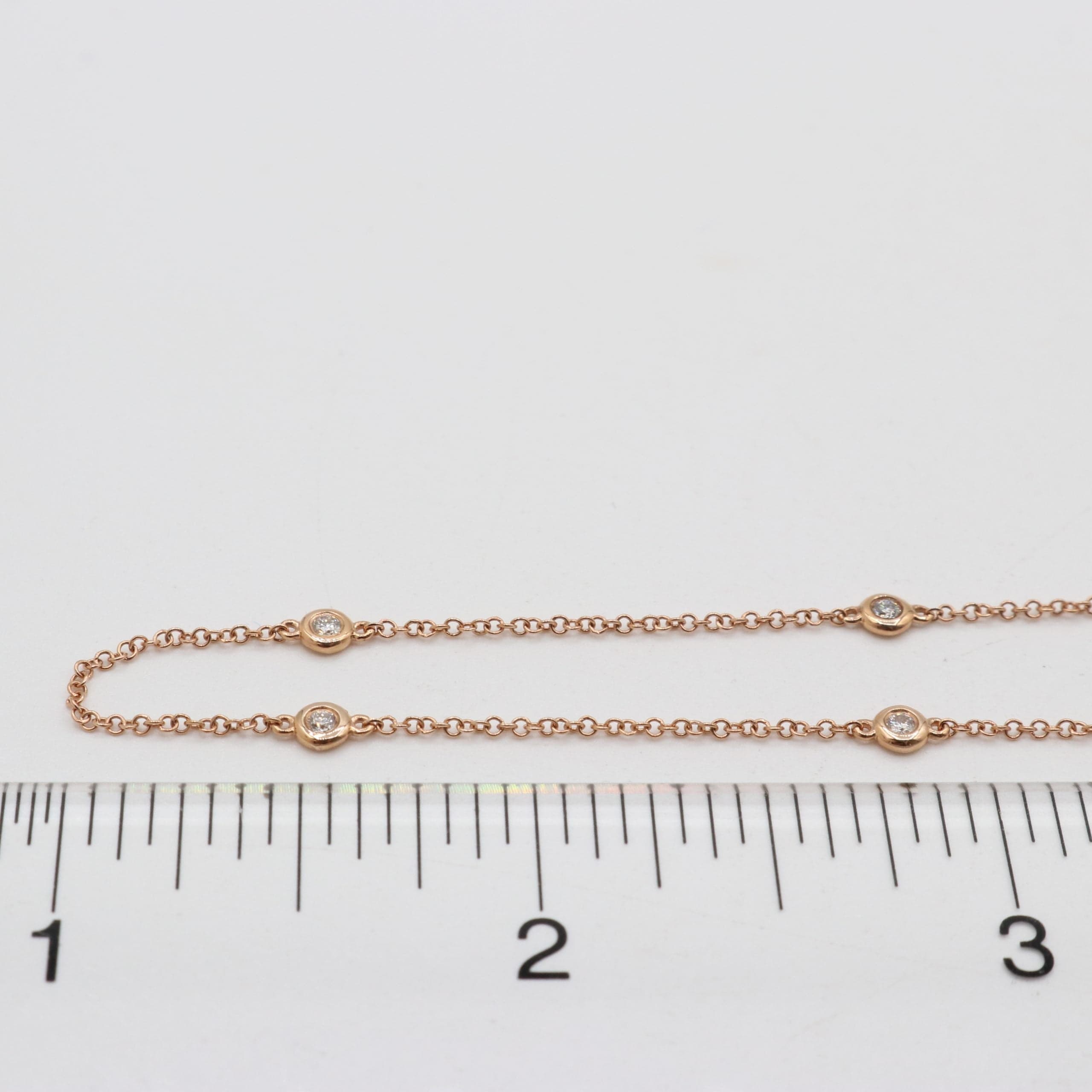 14 Karat Rose Gold & 10 Bezel Set Diamond Necklace Weighing 0.19 Carats. thumbnail 4