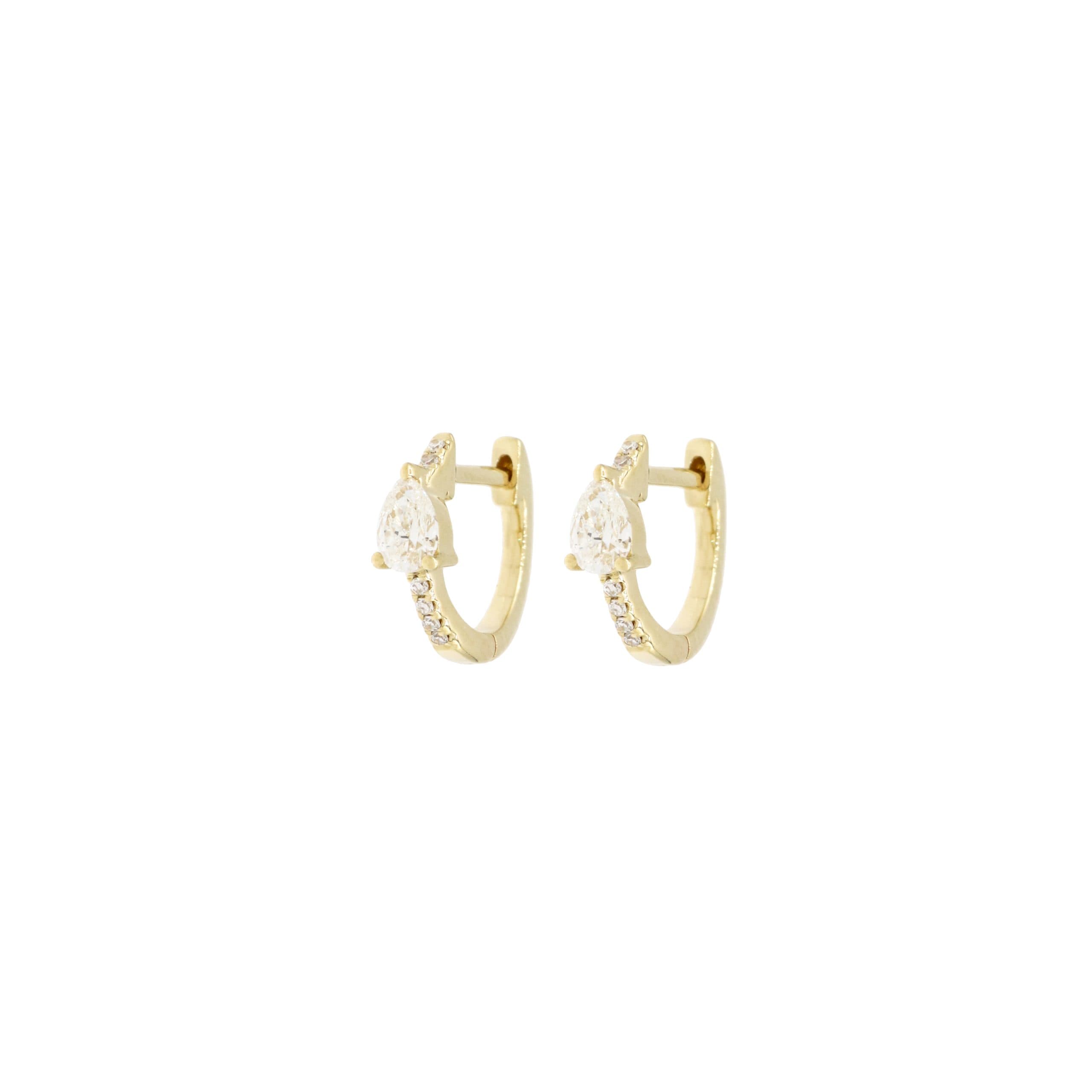 14 Karat Gold, 10mm Earrings Containing 2 Pear Shaped Diamonds Weighing 0.28 Carats & 12 Round Cut Diamonds Weighing 0.30 Carats.